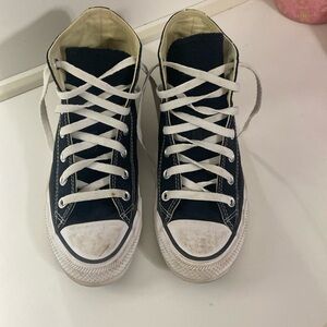 Woman’s 7.5 black high top Coverse